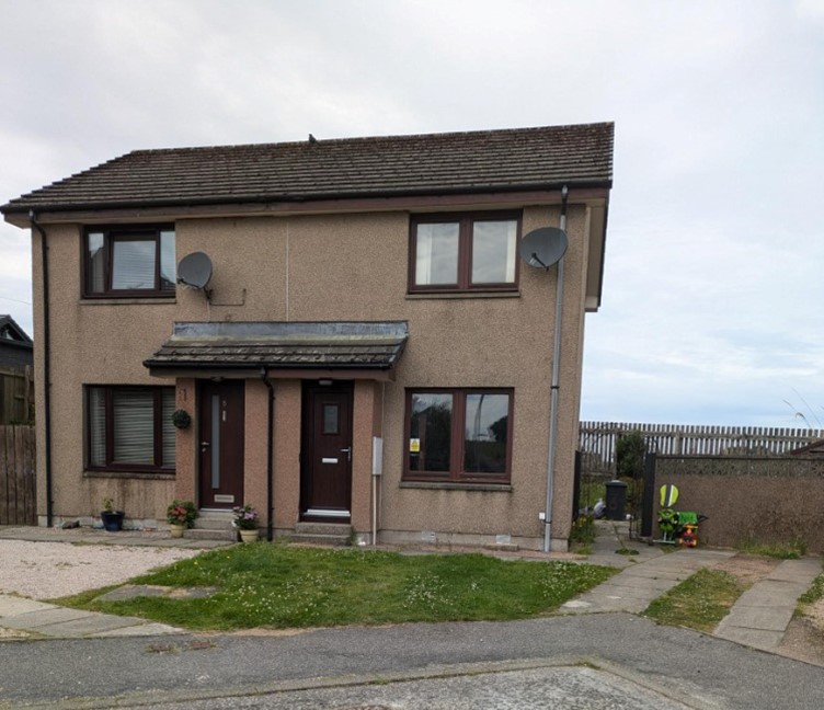 Front of 6 Morrison Court in Maud with small lawn, pavement and side drive.