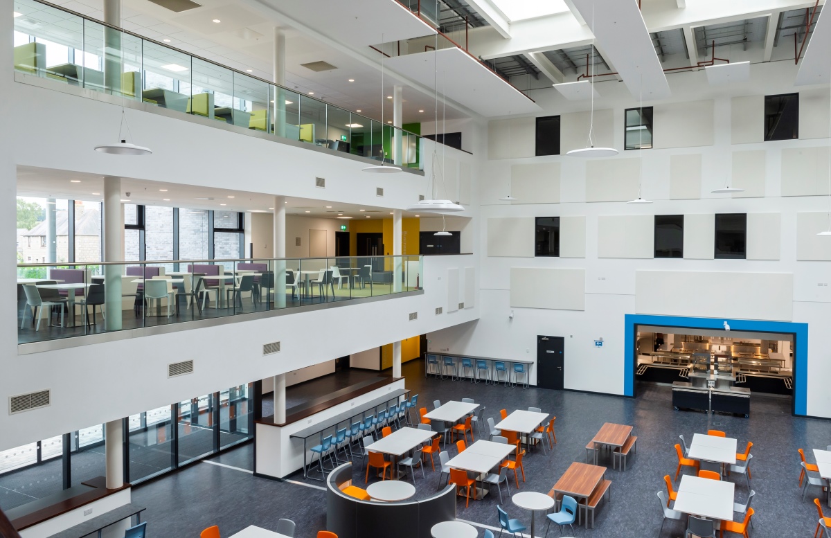 High angle view of inside Inverurie Community Campus, big open space with chairs and tables