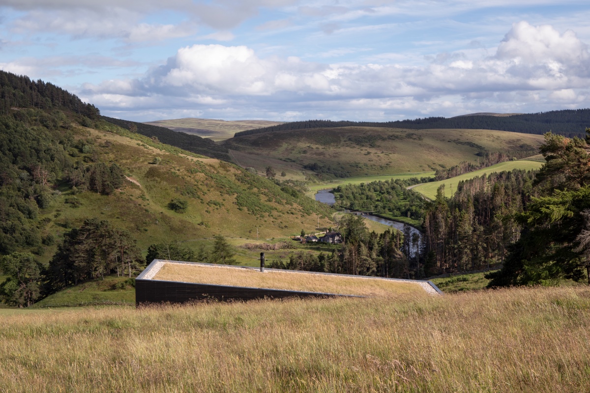 Overlooking Spyon Cop roof, with hills, trees and river in the background