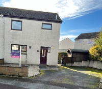 Front of 50 Raeburn Place, semi-detached house with paved drive