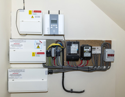 Solar divertor ‘Eddi Switch’ in the meter cupboard of a house.