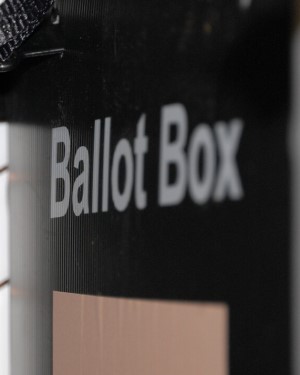 A photo of a black ballot box, with the words 'Ballot Box' in white text.