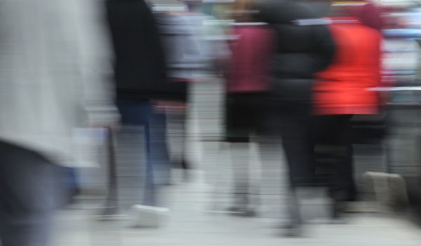 Blurred image of people walking