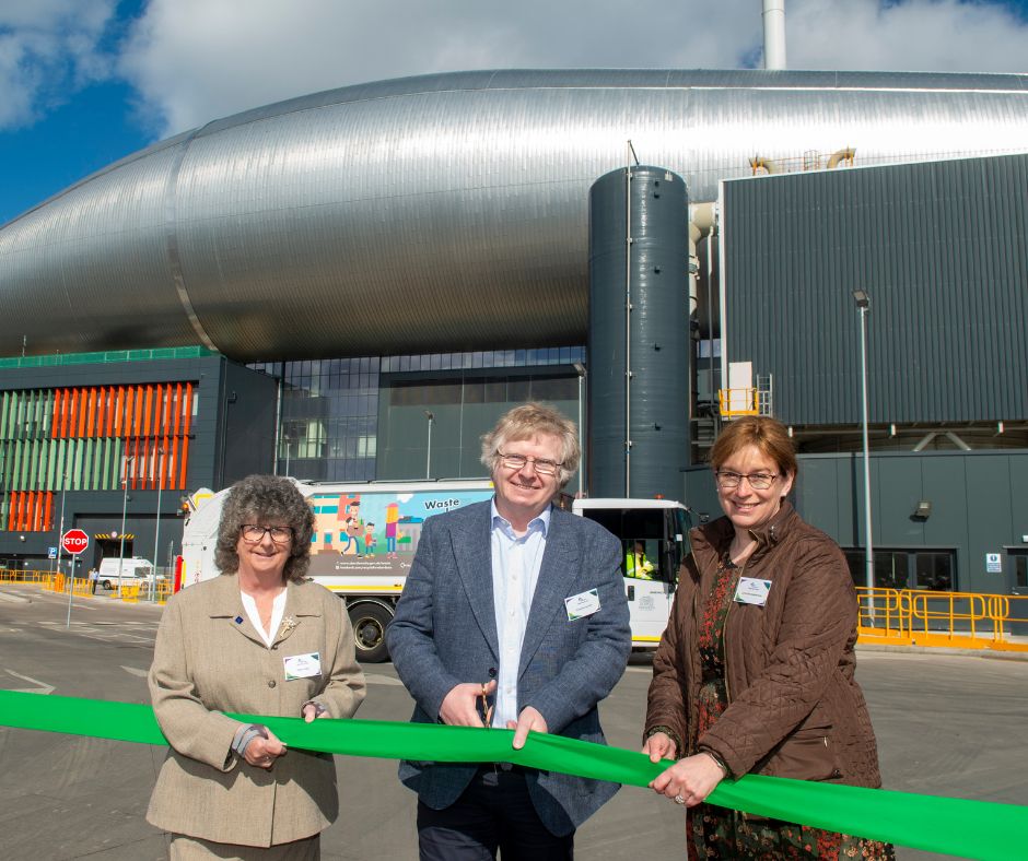 Three council leaders cutting the ribbon at the energy from waste facility—from left to right Gillian Owen for Aberdeenshire, Ian Yuill co-leader for Aberdeen City, and Kathleen Robertson for Moray. 