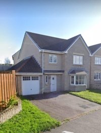 Street view of 8 birch drive, Inverurie, house with garage and paved driveway