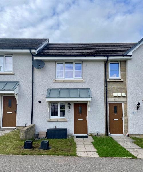 Front of 10 James Gregory Road Drumoak, mid terrace house with small garden at front
