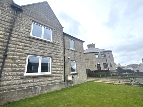 Front of 60 Catherine Street, Banff, showing block of flats with grass area at the front