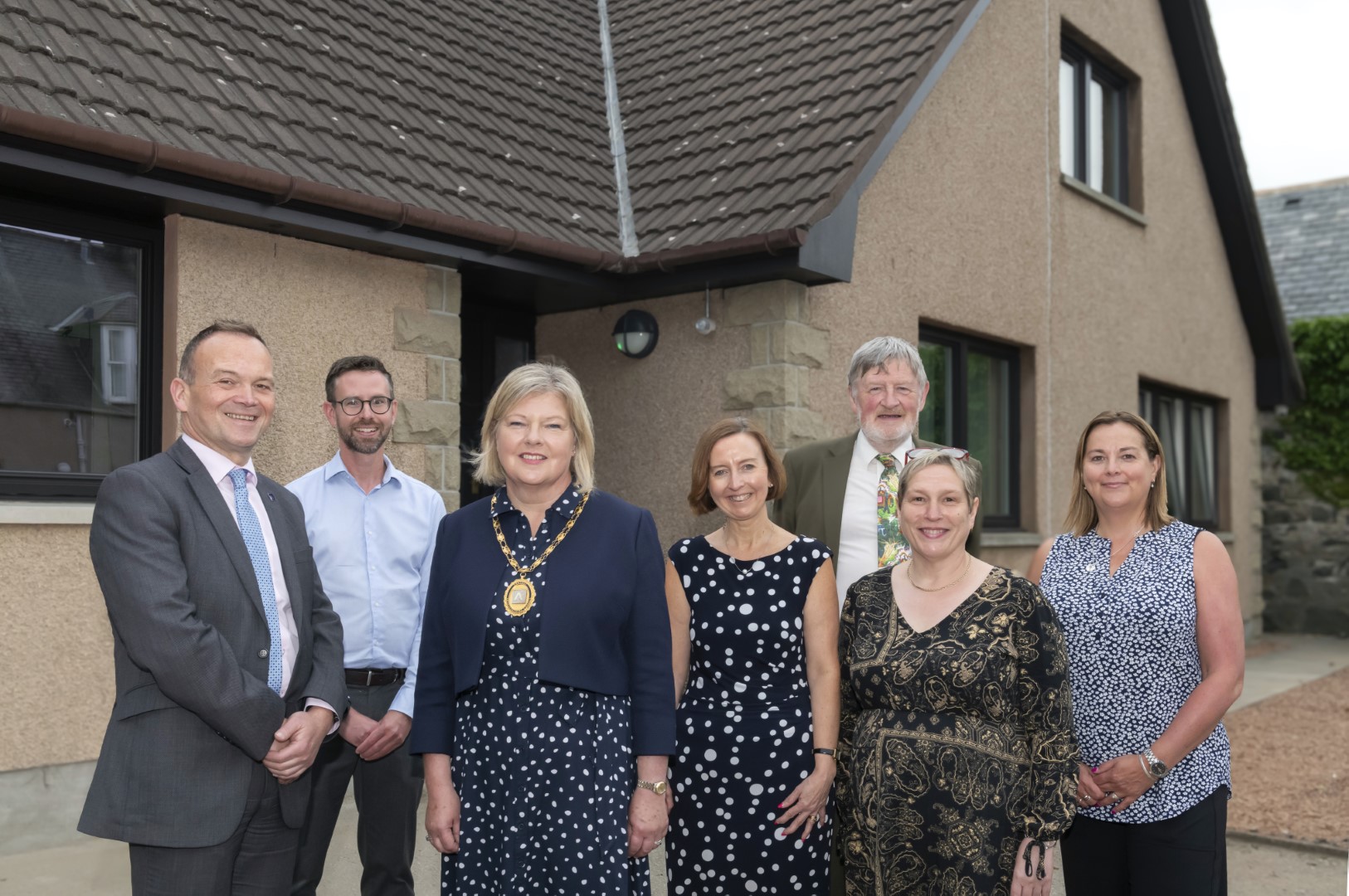 Director of Education Laurence Findlay, Head of Children’s Services and Chief Social Work Officer Andrew Dick, Provost Judy Whyte, HSCP Chief Officer Leigh Jolly, Education and Children's Service Committee Chair Cllr David Keating, team manager Tricia Jamieson, and social work manager Katherine Irvine.